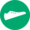 Icon: Weißer, gezeichneter Schuh in einem grünen Kreis.